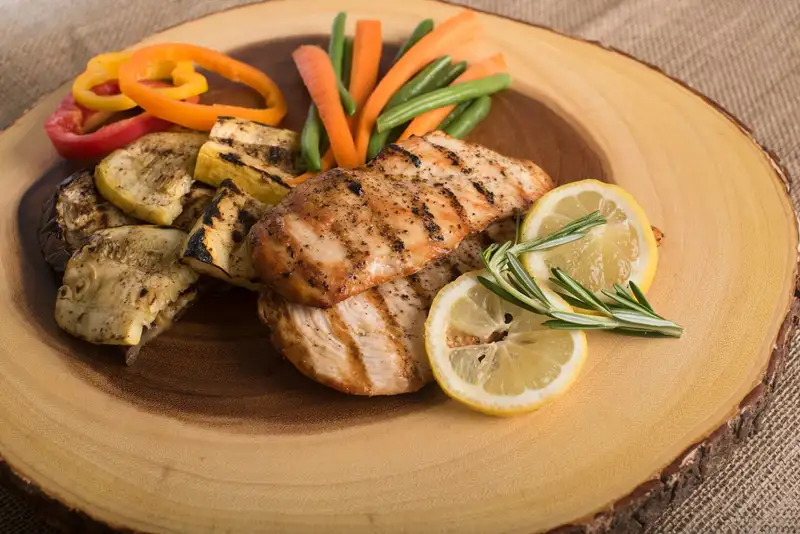 Pan-seared lemon herb chicken with fresh herbs